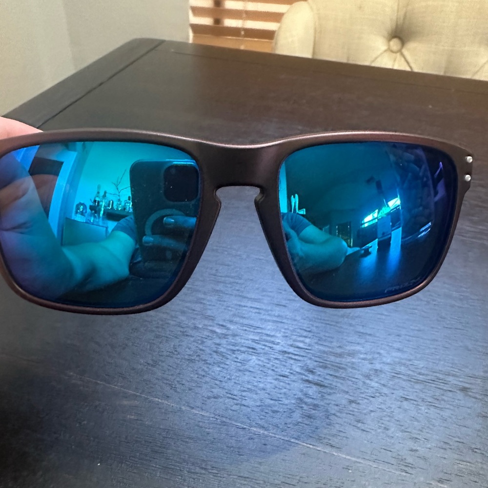 Oakley Sunglasses with Blue Lenses and Maroon Frame Green arms